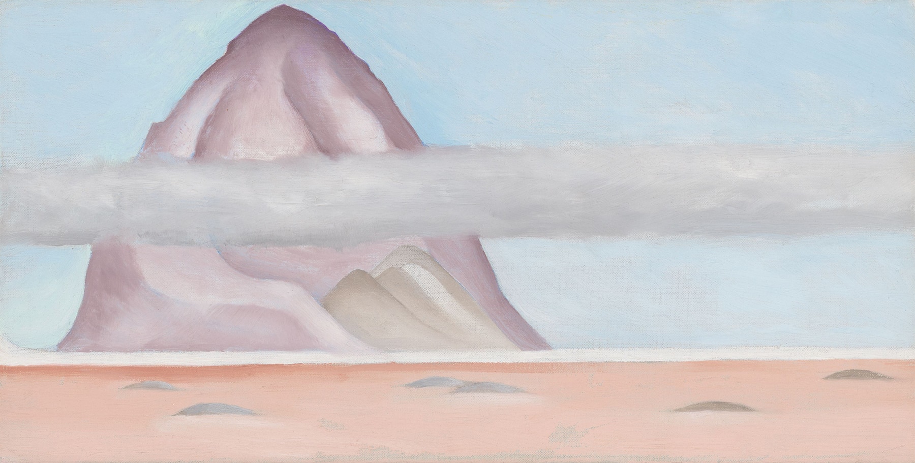 Small horizontal canvas of mysterious pale purple mountain on the left coming out of a salmon colored landscape and a light blue sky. A hazy gray horizontal cloud crosses in front of the hill and stretches the length of the canvas.